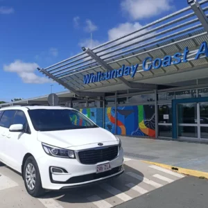 Private Transfer Whitsunday Coast Airport to Airlie Beach — Airlie Airport Bus Kia Carnival